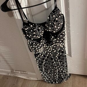 Brand new night out black dress with pearls around it
